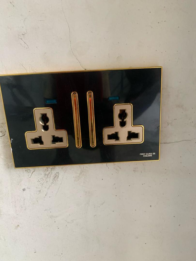 Black and gold double 13A wall socket in stock at Beta Electricals